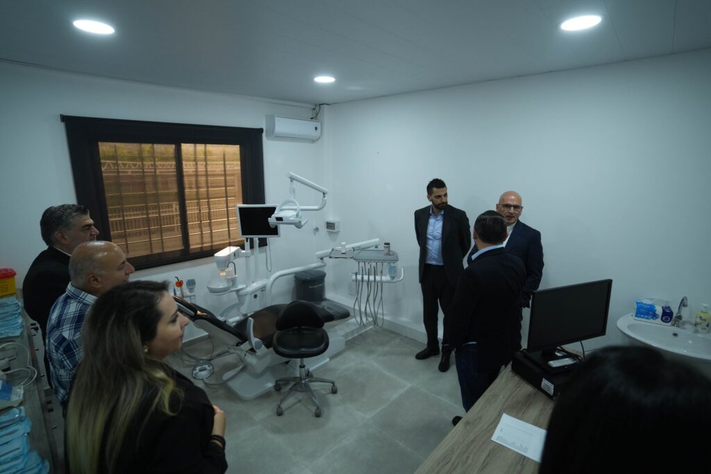 Officials touring the new dental clinic at its inauguration