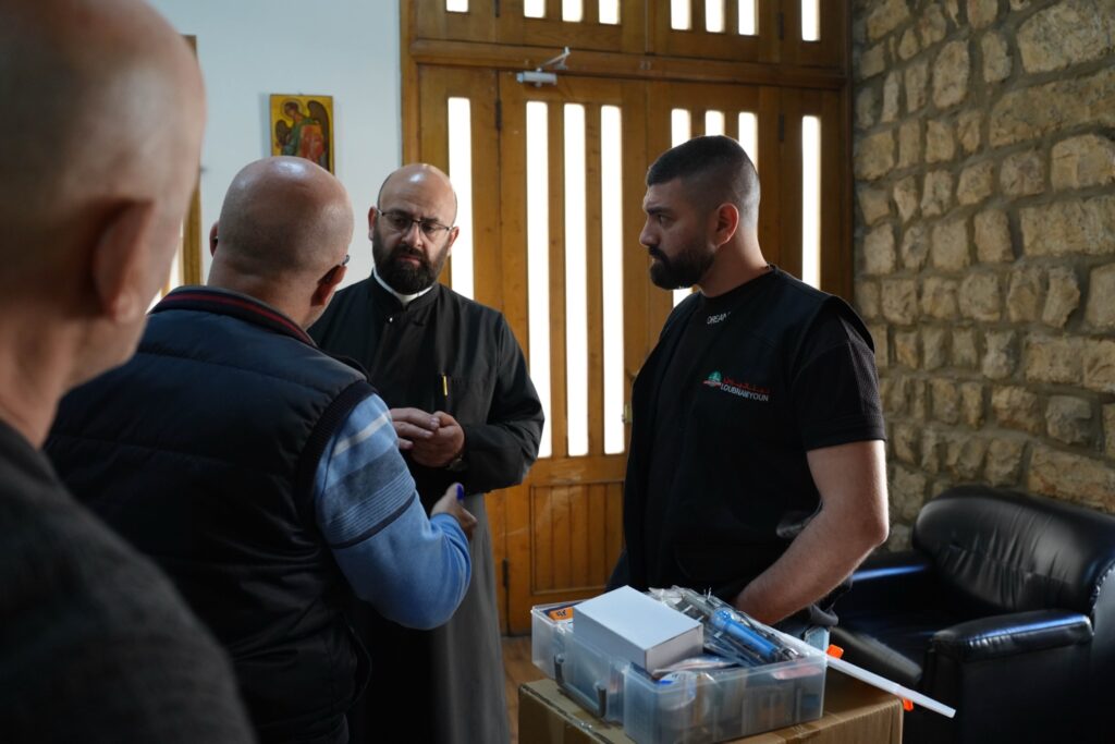 Loubnaniyoun team meeting with school staff to deliver robotics kits